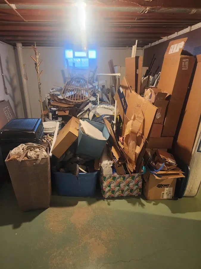 Roll-off dumpster container at job site for 2 Yard Dumpster Rental in Horizon West